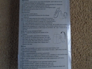Manual cellphone (mobile) charger, brand new and in original packaging.