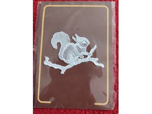 Lace squirrel stuck onto  brown background only £1. in Sandown