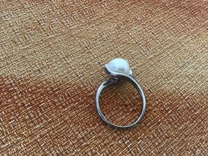 Silver coloured ring with pearl inset in Cowes