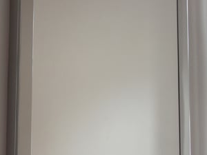 Mirrored corner bathroom cabinet in Shanklin