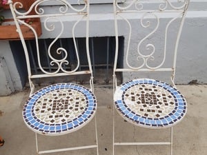 2 tiled metal folding chairs £15 in Cowes