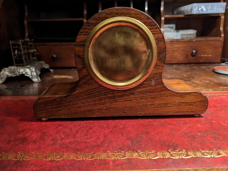 Small mechanical oak mantle/desk clock
