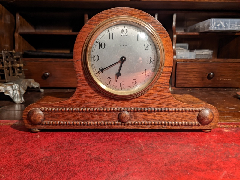 Small mechanical oak mantle/desk clock  in East Cowes