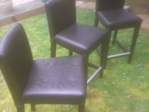 Set of three leather bar stools in Sandown
