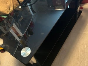 Black glass tv stand. in Ventnor