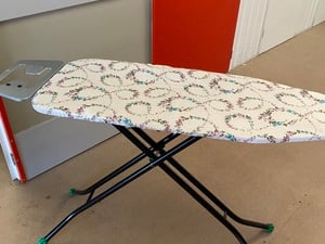 Good condition Ironing board. Collapsible with cover in Sandown