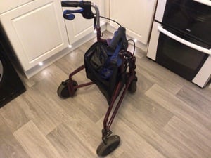 Three Wheeled Walking aid with bag. in Newport