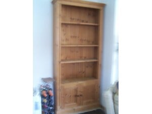 wooden bookcase/ display unit with cupboard in East Cowes