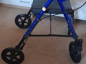 4 WHEELED WALKER WITH SEAT. OPEN TO OFFERS OF AROUND £40 in East Cowes