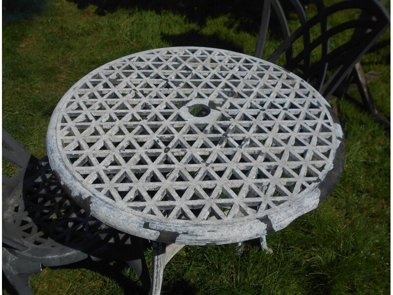 Round white  metal garden table + 2 chairs slightly damaged Garden Furniture in Newport