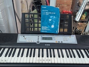 Yamaha keyboard and stand  in Newport