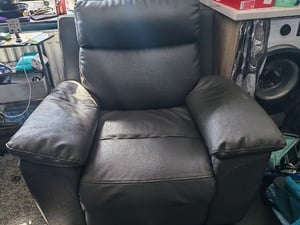 Dark grey leather recliner arm chair in Ryde