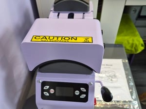 Hat press in Ryde