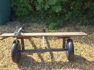 Boat launching trailer