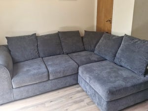 EXCELLENT CONDITION GREY CORNER SOFA WITH FOOTSTOOL in Sandown