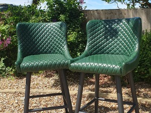 Pair of dark green leather effect bar/kitchen island chairs in Ventnor
