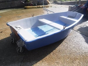 PRAM DINGHY, 2.4m/ 8 ft, WITH RETRACTABLE WHEELS, TOGETHER  WITH OARS AND ROWLOCKS, ETC. in East Cowes