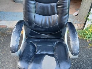 Black swivel chair in Newport
