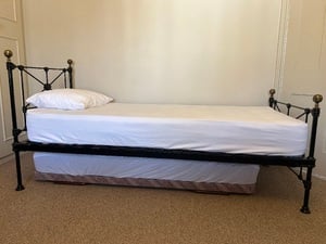 Pristine matching single beds in Ryde