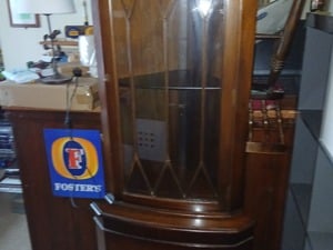 Corner unit with glass door at the top and cupboard below.with both keys in Ryde