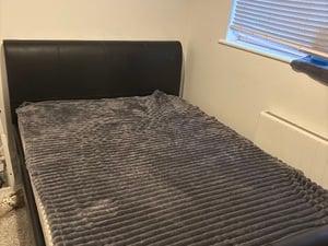 Black leather double bed frame in Ryde